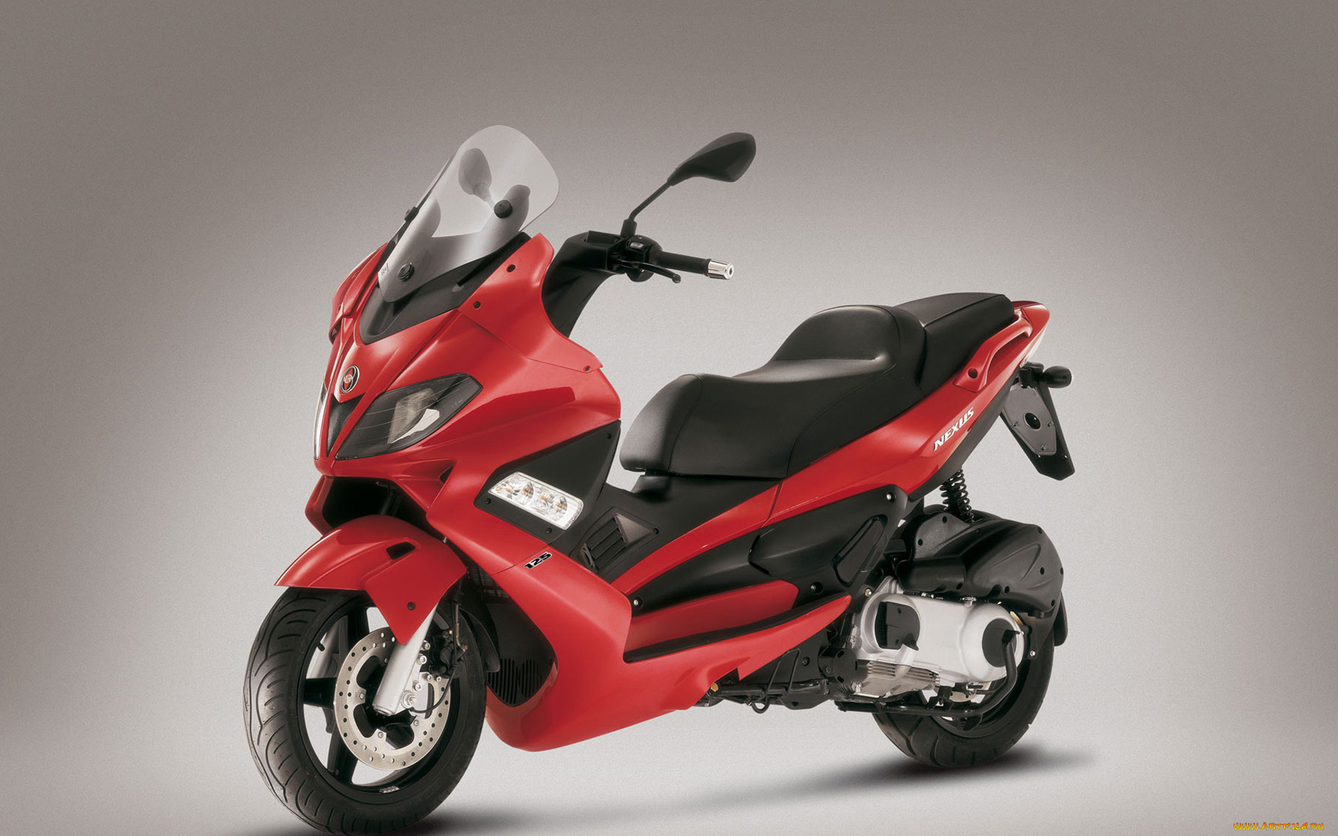 Скутер фото. Gilera Nexus 125. Нексус скутер 125. Гилера 125 мотоцикл. Скутер мотоцикл Gilera.